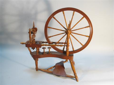 Appraisal: AMERICAN MAPLE SPINNING WHEEL Nineteenth century - h w in