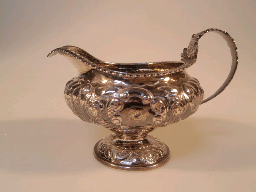 Appraisal: A George IV silver milk jug with gadroon border and