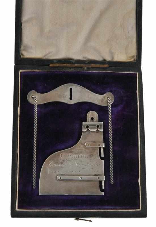 Appraisal: A CASED SILVER ROWING MEDAL DATED The miniature rudder engraved