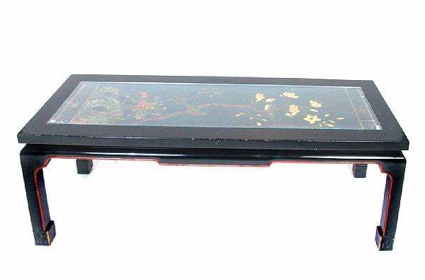 Appraisal: A Chinese style black and red lacquer table with inset