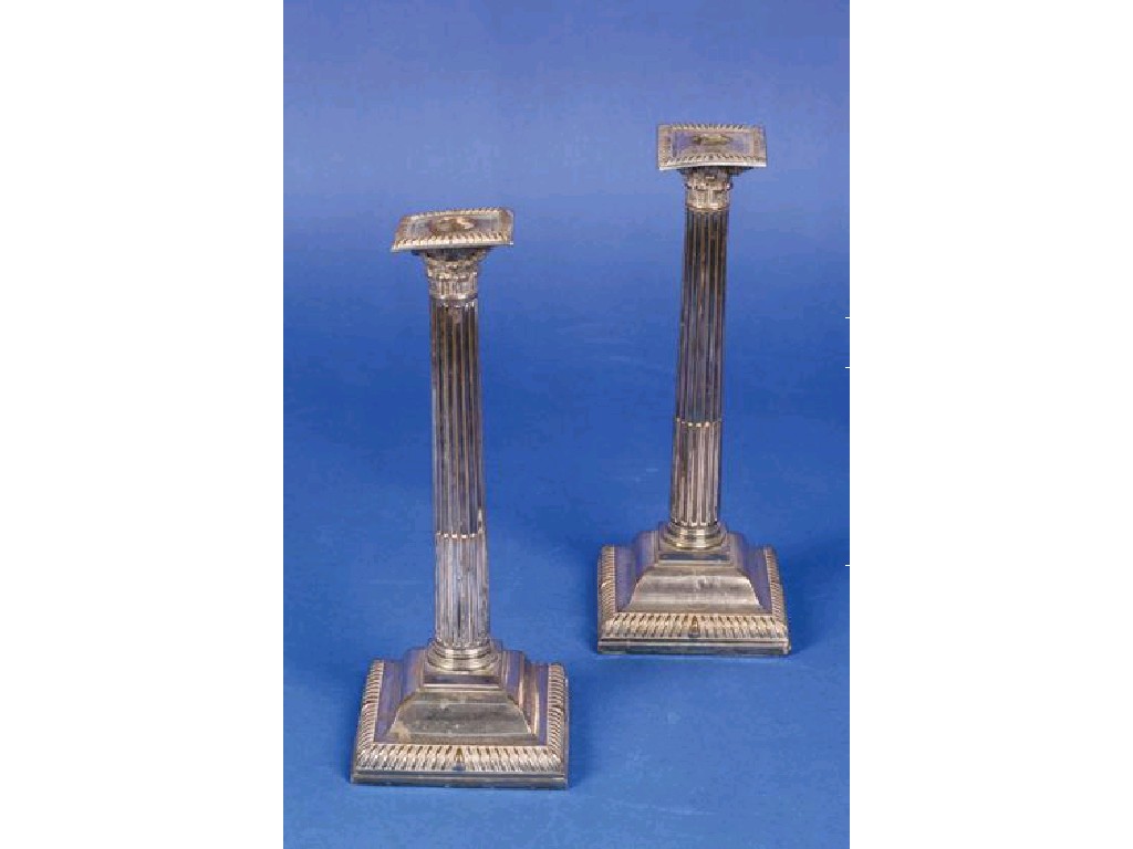 Appraisal: A PAIR OF OLD SHEFFIELD PLATE CANDLESTICKS of corinthian form