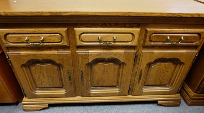 Appraisal: Modern oak draw sideboard with lower cupboards