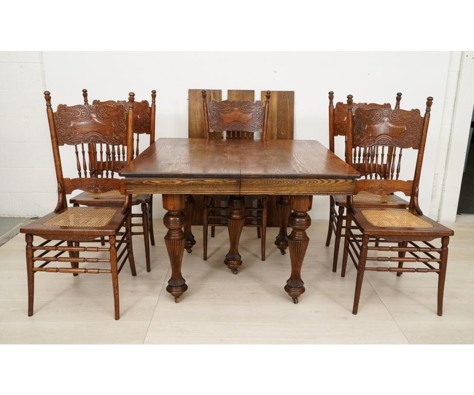 Appraisal: Oak table circa with ornately carved legs and three leaves