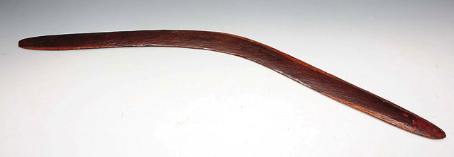 Appraisal: AN OLD ABORIGINAL BOOMERANG polished wood with traces of red