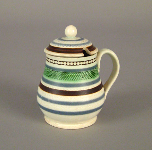 Appraisal: Mocha mustard pot th c with blue and brown bands