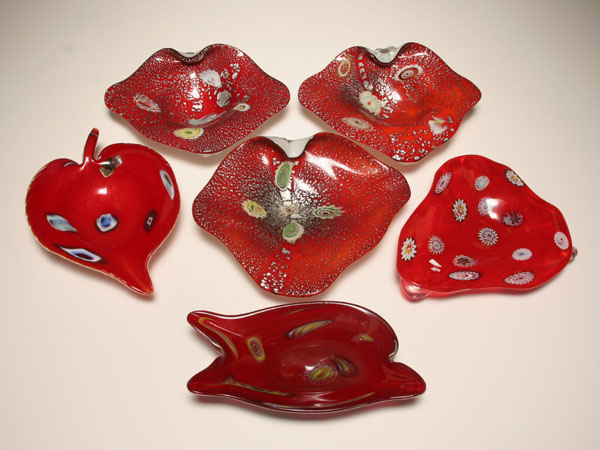 Appraisal: Six Murano red art glass bowls and ashtrays Internal murrine