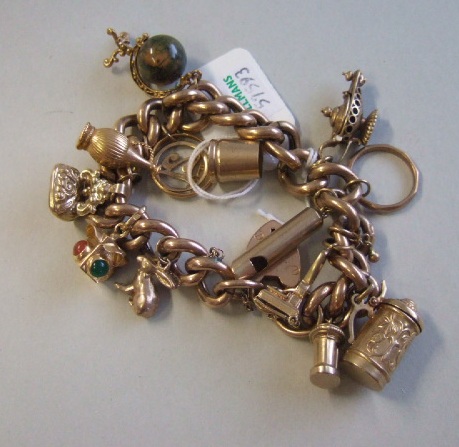 Appraisal: A gold curb link charm bracelet on a ct gold