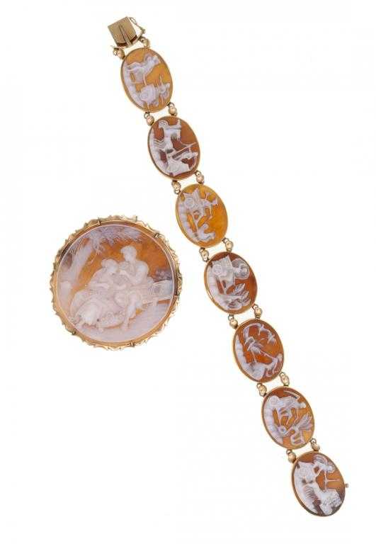 Appraisal: A CAMEO BRACELET composed of seven oval camei each shell