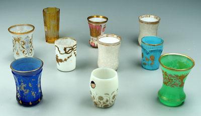 Appraisal: Ten tumblers and beakers one paneled amber beaker running stags