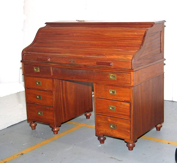 Appraisal: A late Victorian mahogany roll top desk last quarter th