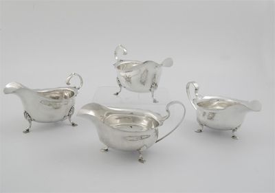 Appraisal: Two pairs of modern sauce boats one pair by Stokes