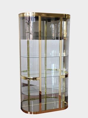 Appraisal: A Tall Glass Display Cabinet with Shelves Polished brass and