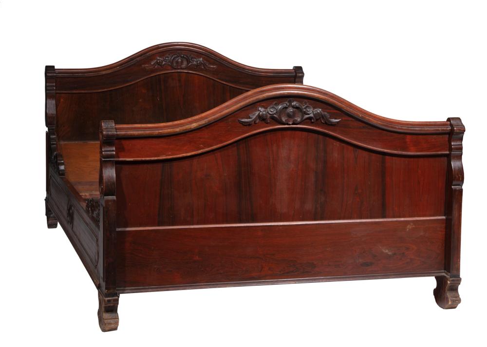 Appraisal: AMERICAN ROCOCO CARVED ROSEWOOD BEDSTEADAmerican Rococo Carved Rosewood Bedstead mid-