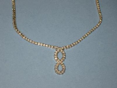 Appraisal: A DIAMOND NECKLACE comprising a line of brilliant cut diamonds