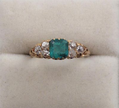 Appraisal: An emerald and diamond seven stone ring The square shaped