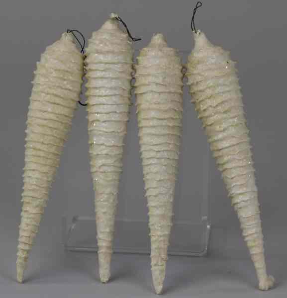 Appraisal: FOUR PRESSED COTTON ICICLE ORNAMENTS Icicles embellished with fine mica