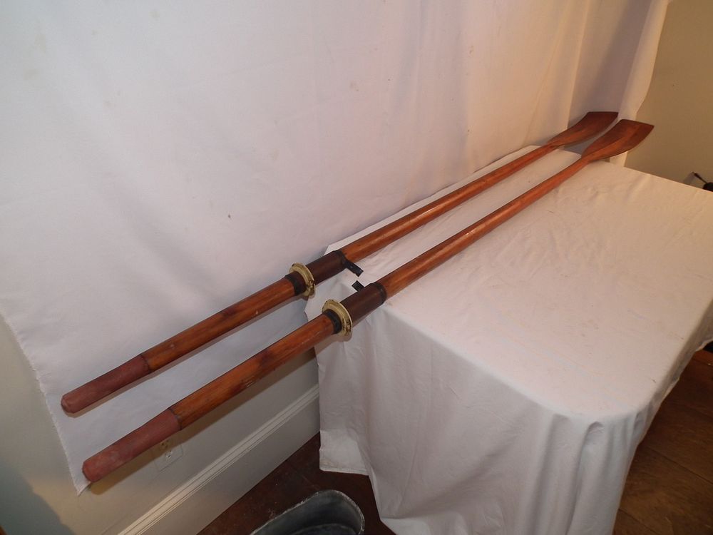 Appraisal: PAIR ANTIQUE SCULLING OARS Pair of antique wood sculling oars