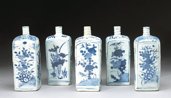 Appraisal: A group of five blue and white porcelain square bottles