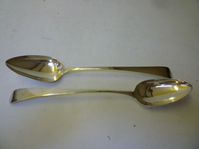 Appraisal: A PAIR OF LATE GEORGE III BASTING SPOONS makers Peter