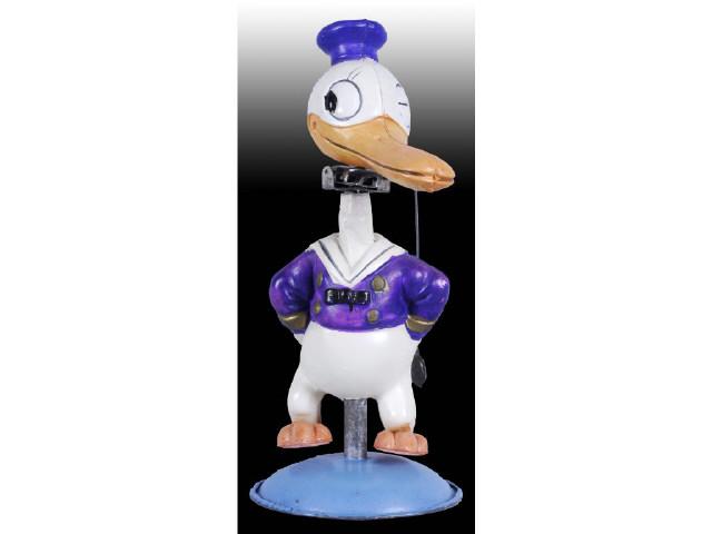 Appraisal: Walt Disney Celluloid Donald Duck Nodder Toy Description Celluloid figure