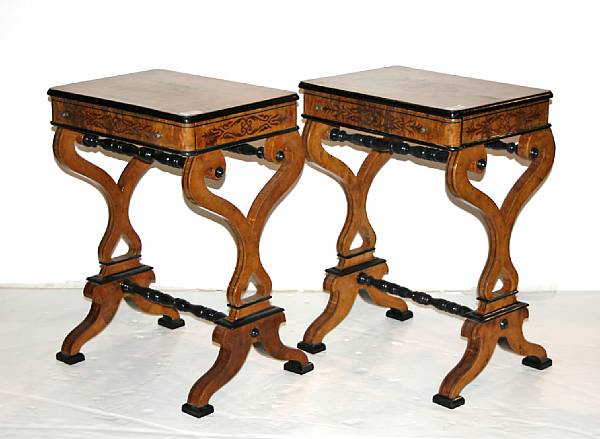 Appraisal: A pair of parcel ebonized work tables height in width