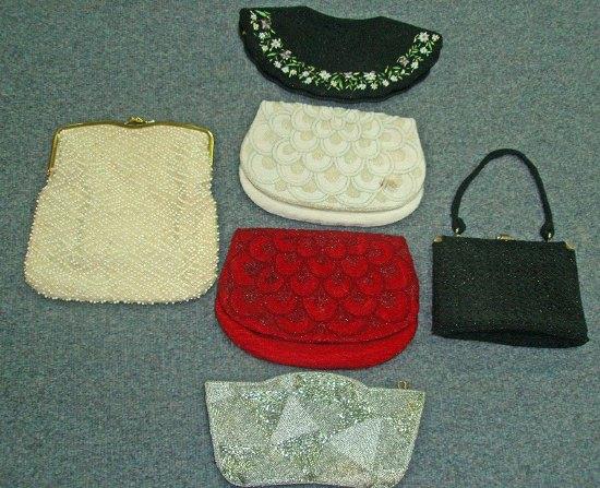 Appraisal: Two fold-over clutch bags together with sundry bags