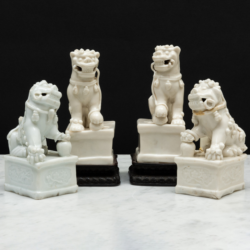 Appraisal: Two Pairs of Blanc de Chine Porcelain Buddhistic Lion Joss