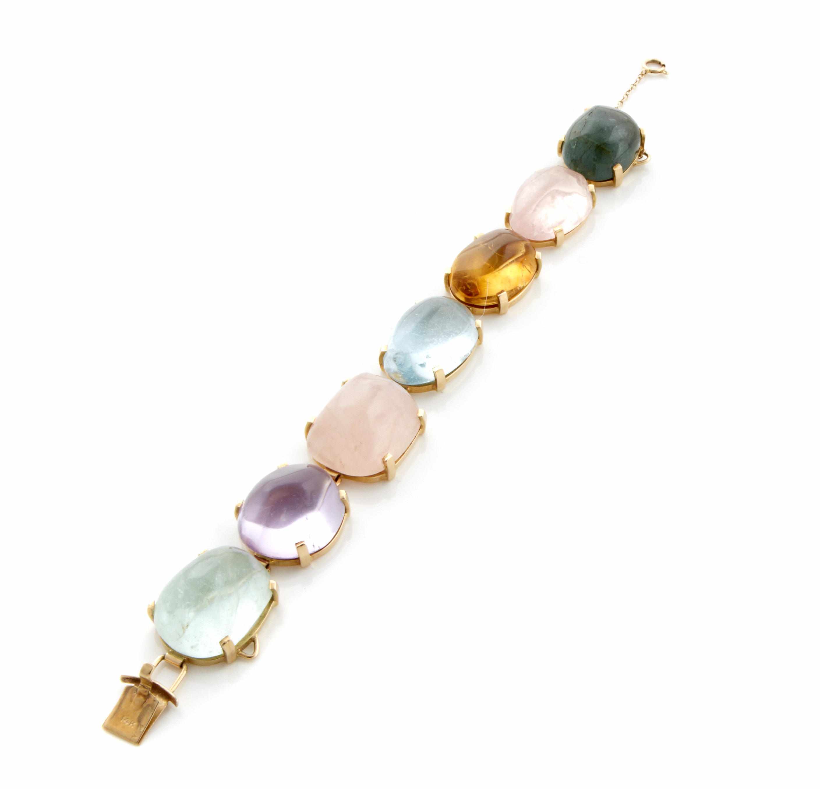 Appraisal: A multi-colored gem-set and k gold bracelet length in