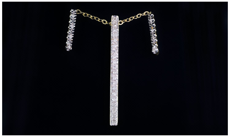 Appraisal: ct Gold Diamond Pendant And Earrings Comprising Diamond Line Earrings