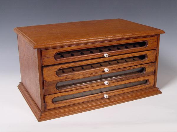 Appraisal: VICTORIAN WALNUT FOUR DRAWER SPOOL CABINET Holds spools of thread