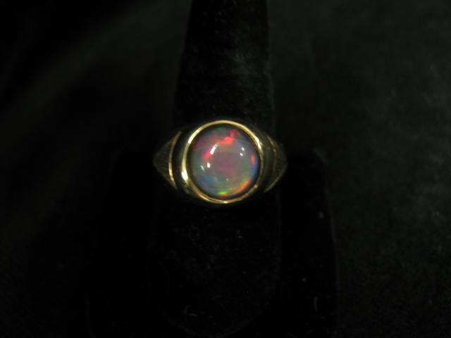 Appraisal: Mans Ring black opal doublet in heavy k yellow gold