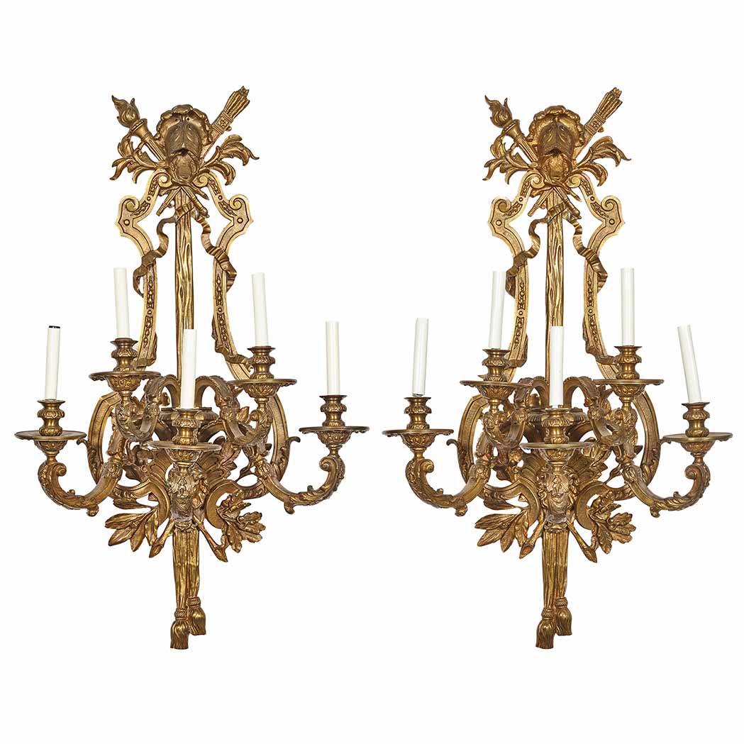 Appraisal: Pair of Transitional Louis XV XVI Style Gilt-Metal Five-Light Sconces