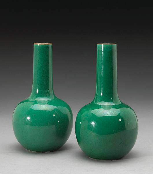 Appraisal: A pair of 'apple green' glazed stick neck vases th