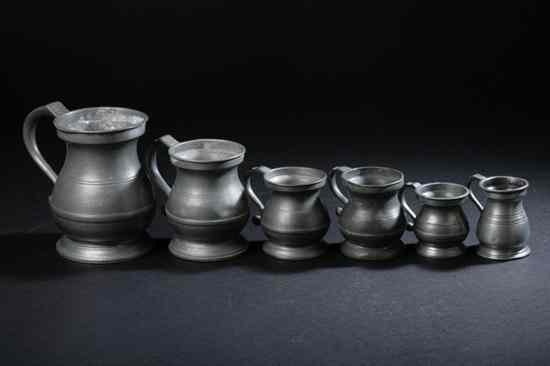 Appraisal: SIX ENGLISH PEWTER SPIRIT MEASURES th century Including pint half-pint