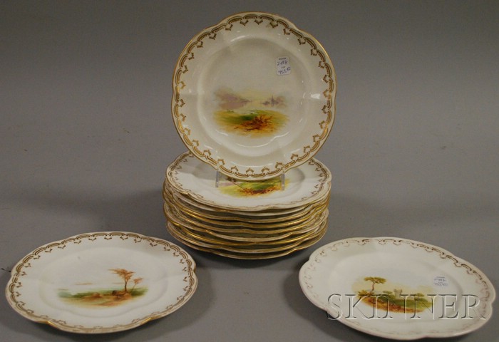 Appraisal: Set of Twelve Gilt and Hand-painted Landscape Decorated Porcelain Plates