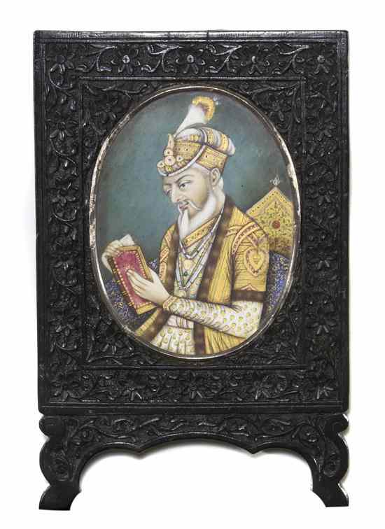 Appraisal: A Persian Portrait Miniature on Ivory the polychrome scene set