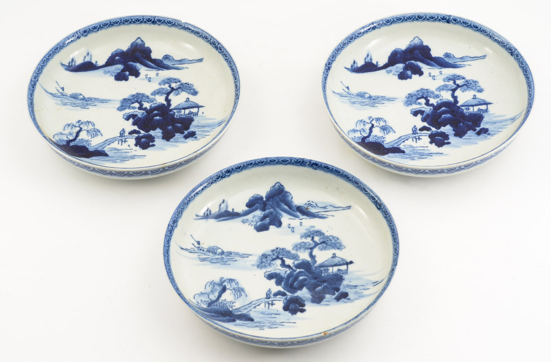 Appraisal: CHINESE BLUE WHITE DECORATED LOW BOWLS with matching genre scene