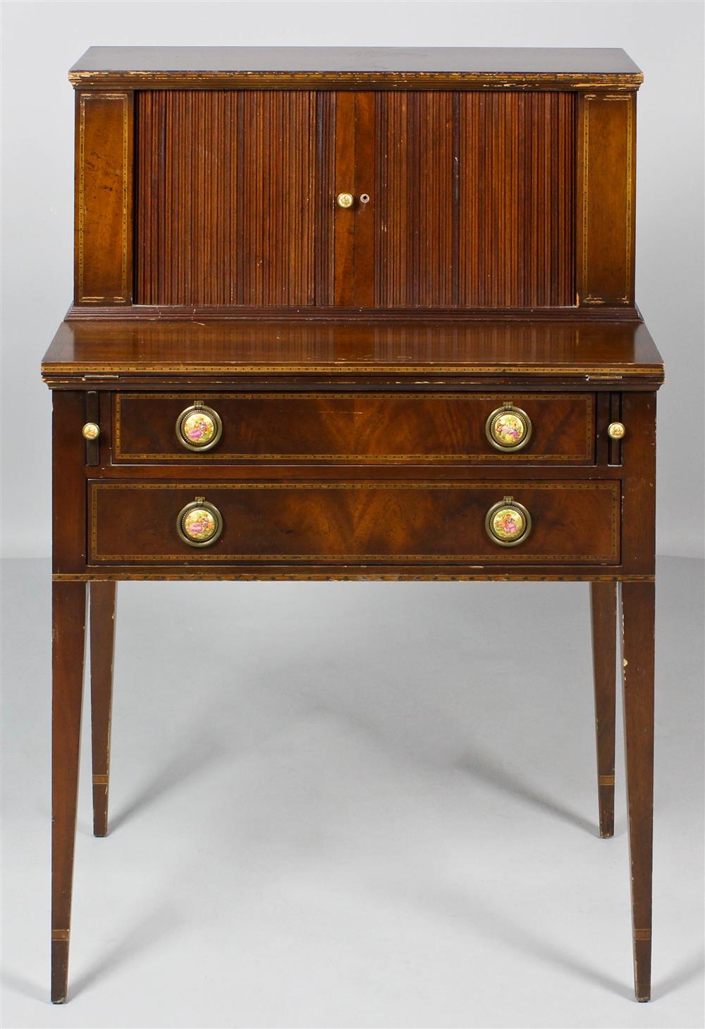 Appraisal: LADY'S WRITING DESK with tambour upper section enclosing a fitted