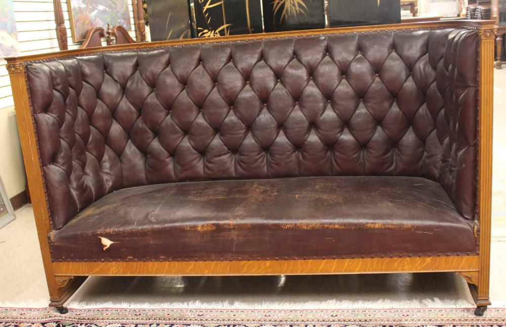 Appraisal: UPHOLSTERED AND CARVED OAK HIGH-BACK SOFA American c H x