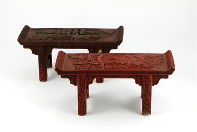 Appraisal: A pair of Chinese red lacquer tables each top carved