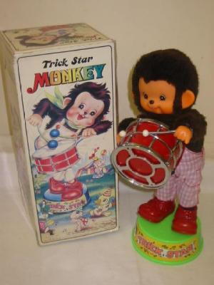 Appraisal: A Trick Star drumming monkey plastic battery powered high boxed