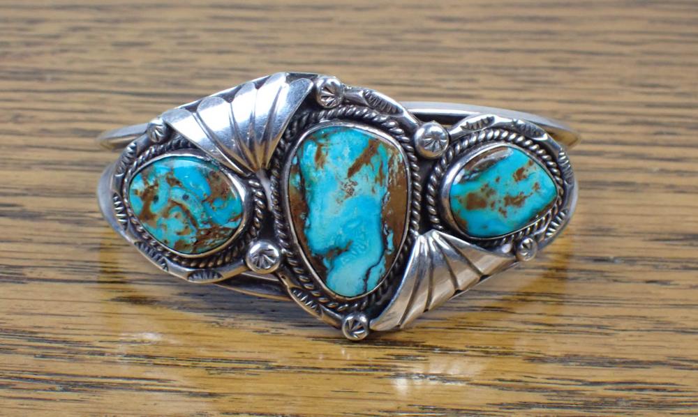 Appraisal: NATIVE AMERICAN SILVER TURQUOISE CUFF BRACELET the open work bracelet