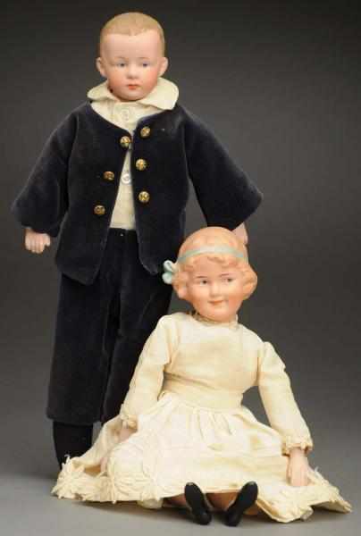 Appraisal: Lot of Heubach Character Dolls German bisque shoulder head with