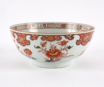 Appraisal: A Chinese bowl painted chrysanthemums and peony in iron red