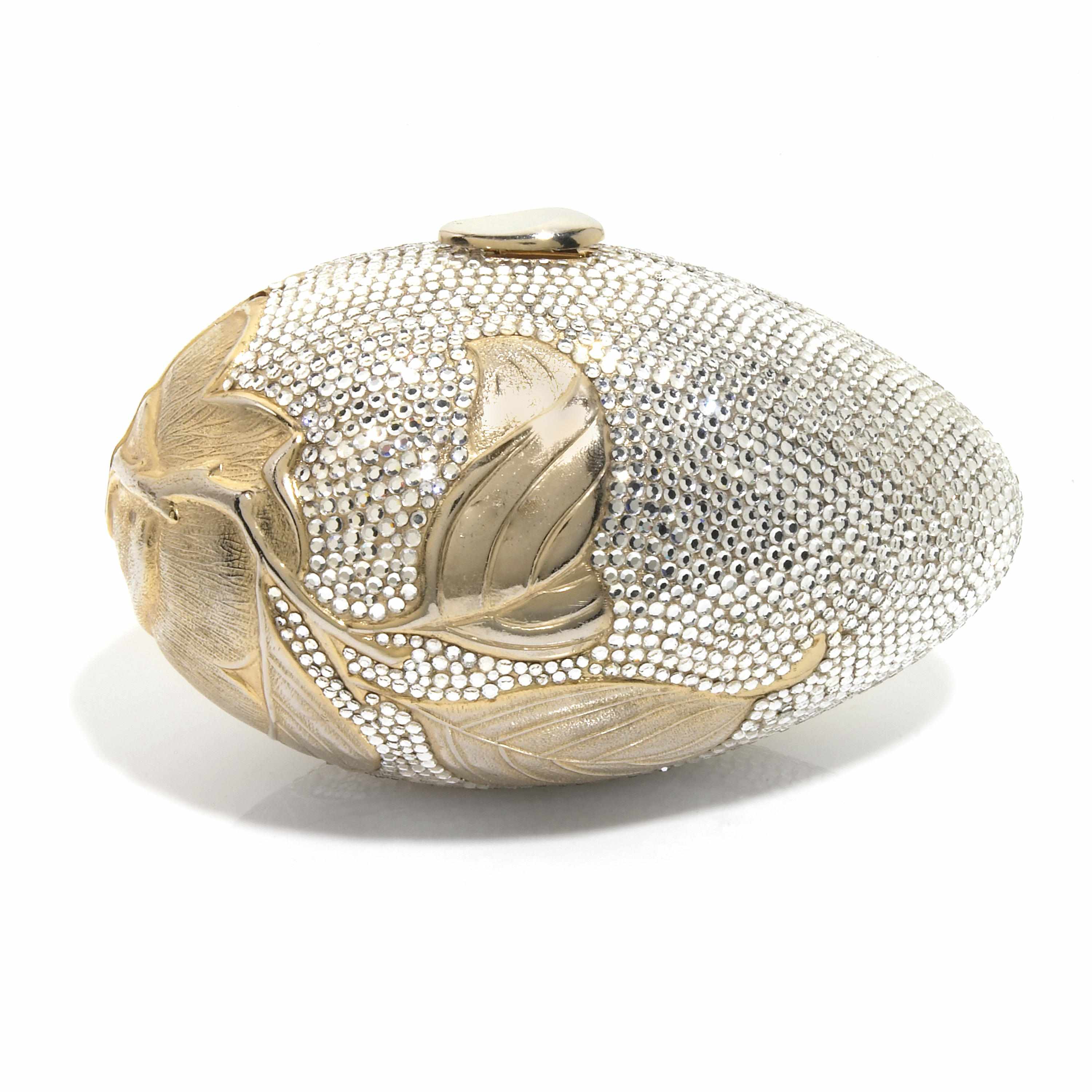 Appraisal: A silver crystal and gold colored metal egg purse with