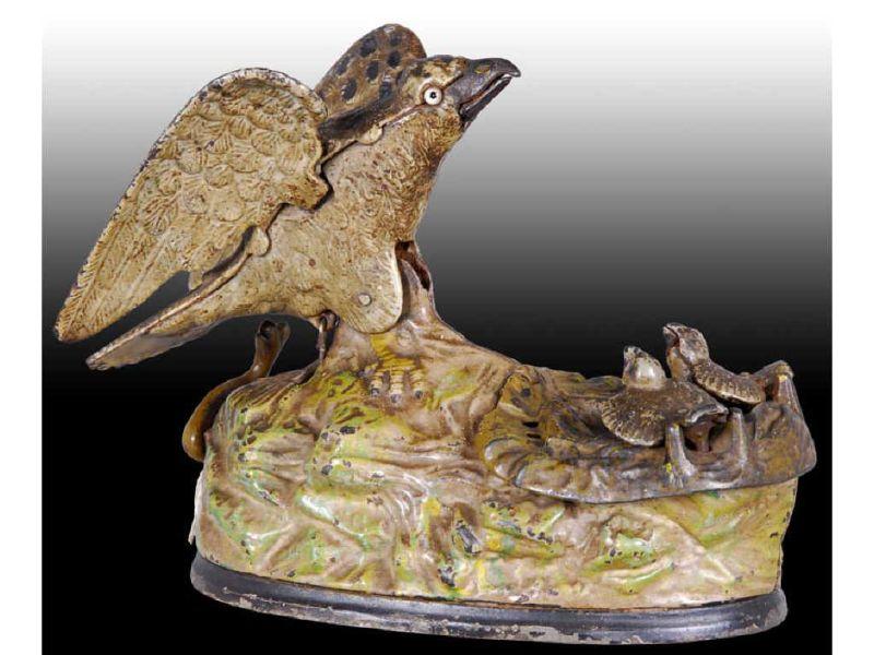 Appraisal: Eagle Eaglets Cast Iron Mechanical Bank Description Circa Manufactured by