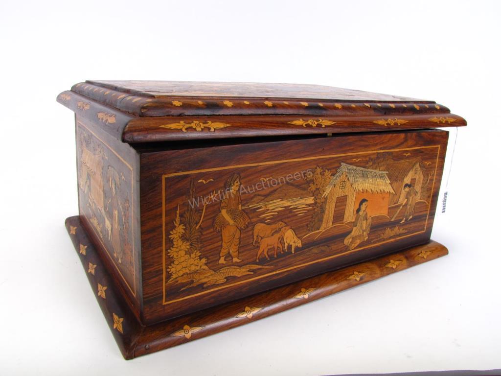 Appraisal: A rosewood box with hinged lid inlaid with scenic and