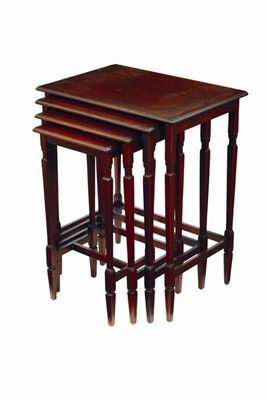 Appraisal: A quartetto nest of mahogany tables each with a satinwood