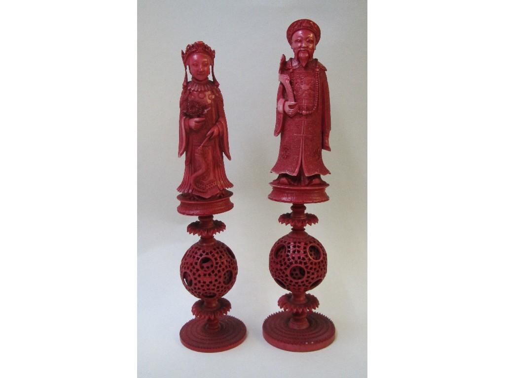 Appraisal: A pair of Chinese export ivory red stained King and