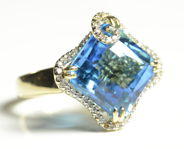 Appraisal: BLUE TOPAZ AND DIAMOND RING k yellow and white gold